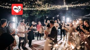 Bride and groom dancing during live wedding band performance in Tuscany