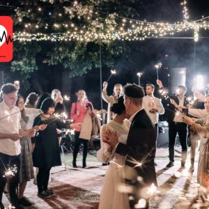Bride and groom dancing during live wedding band performance in Tuscany